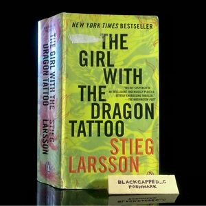Book ”The Girl With the Dragon Tattoo” PB Mystery Suspense Yellow